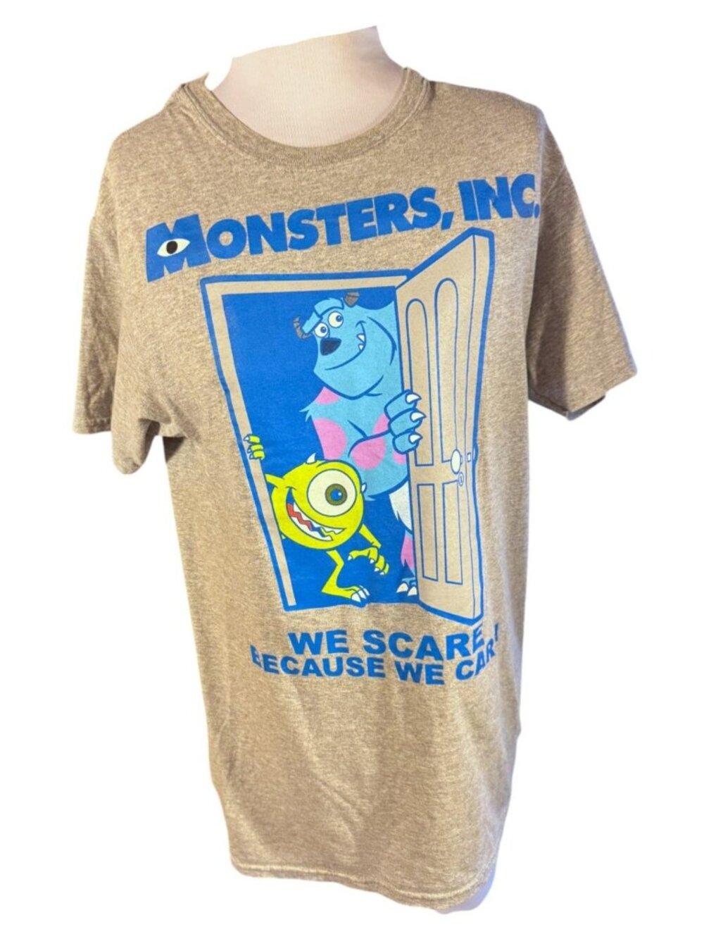 Pixar Monsters Inc Gray Graphic Tee We Scare Because We Care Design S